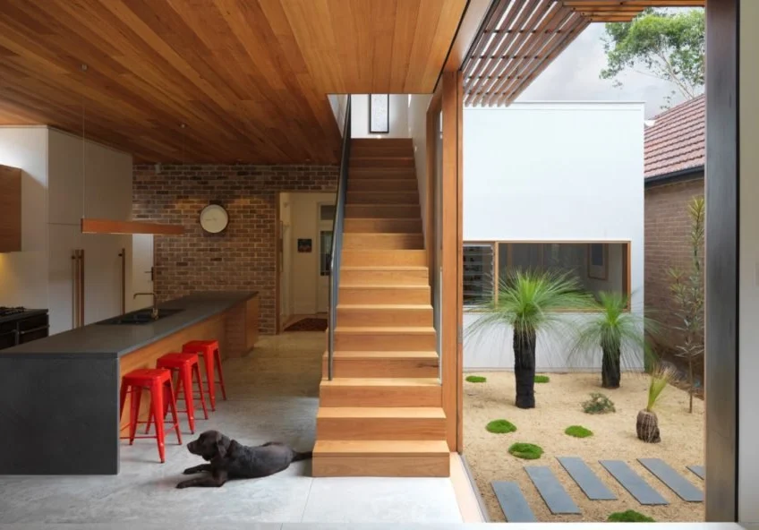 Anderson Architecture revamps a dim heritage home into a modern sun-soaked abode